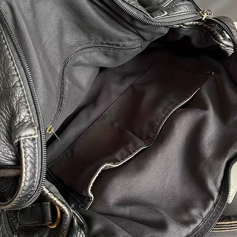 Sônia | Bolsa de mão preta de couro vintage elegante